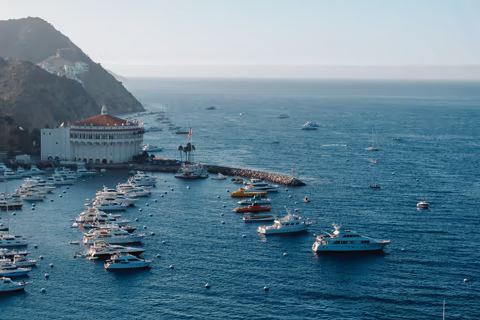 Boats in Avalon Harbor beside the Catalina Casino on Santa Catalina Island